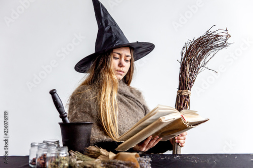 Картината върху платно A young woman wearing a witch costume