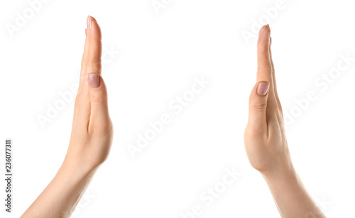 Female hands holding something on white background