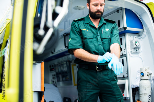 Paramedics at work with an ambulance