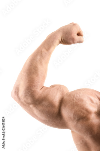 Arm of muscular bodybuilder on white background