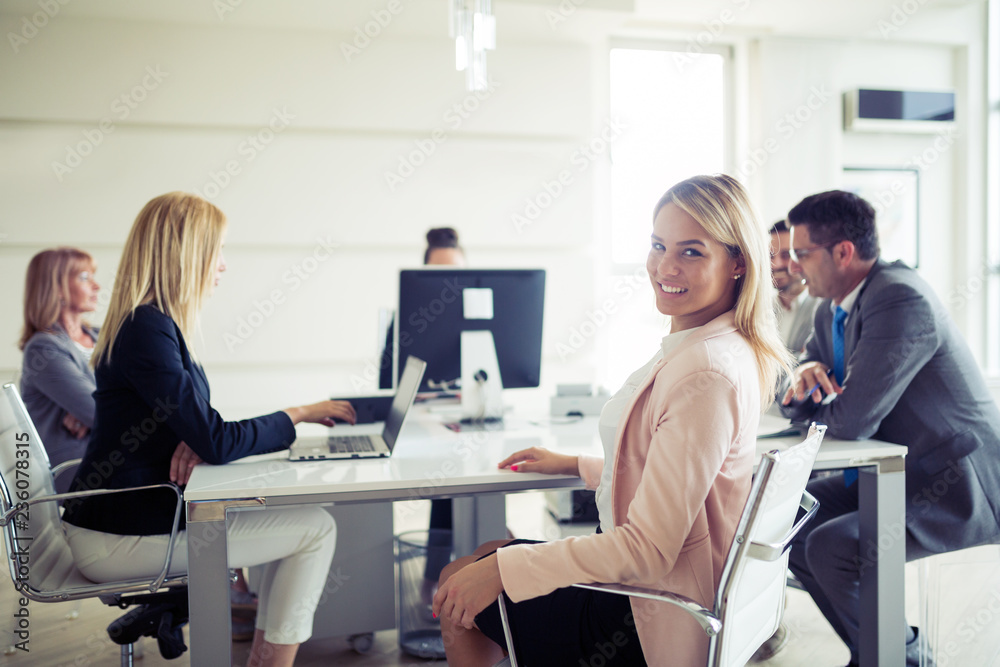 Picture of sales agents working together in office Picture of sales agents working together in office
