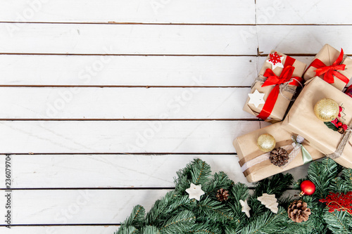 Christmas presents and boxes on wooden background