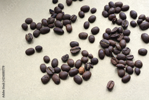 brazilian coffee grains on beige background