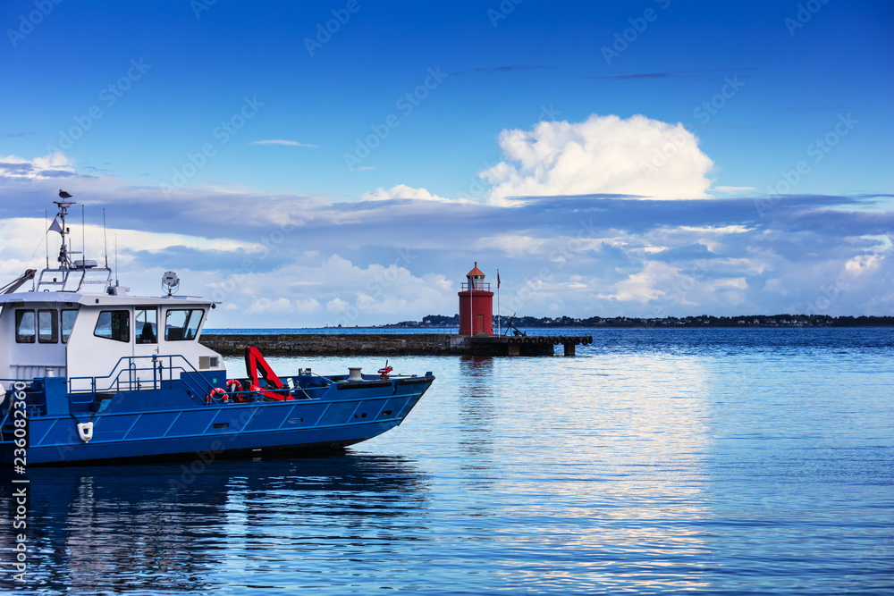 Lighthouse on sea under the sky