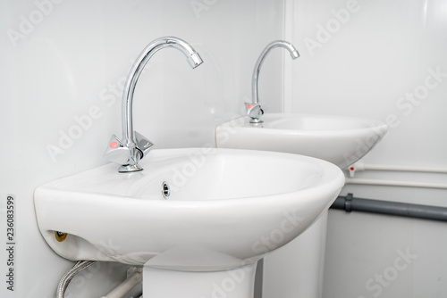 The photo of a sink in a bathroom