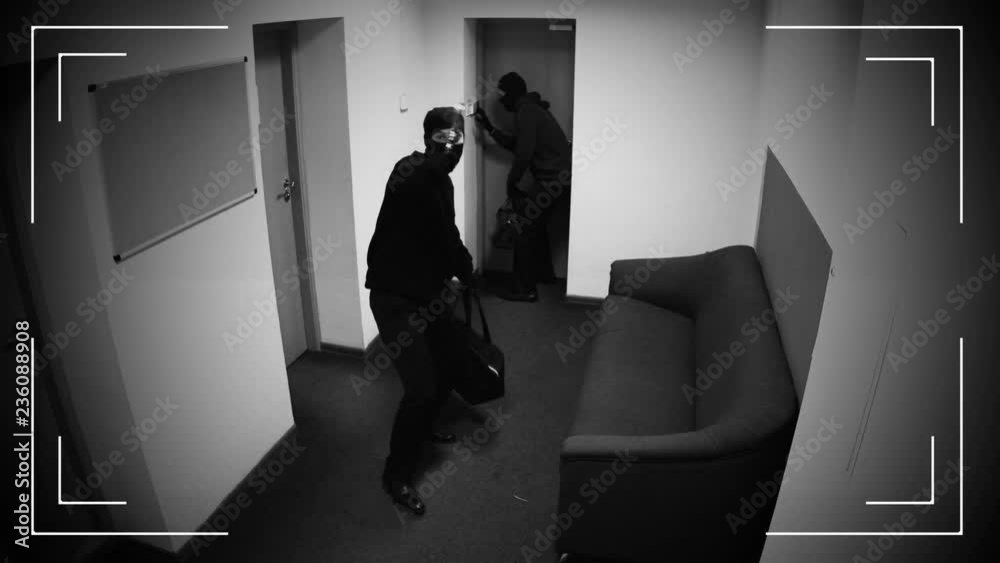 Two men with guns breaking in apartment, shooting in surveillance camera, crime