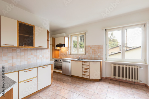 Vintage kitchen with wooden wall units