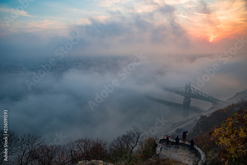 floating fog in Budapest sunrise at Citadella Gellert hill