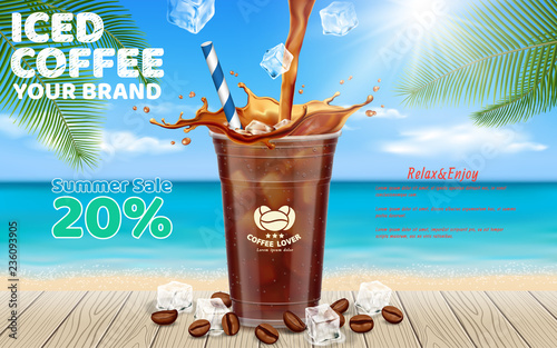 Iced coffee pouring into takeaway cup placed on wooden table with ice cubes, coffee beans ,coconut leaf set for summer beach background.