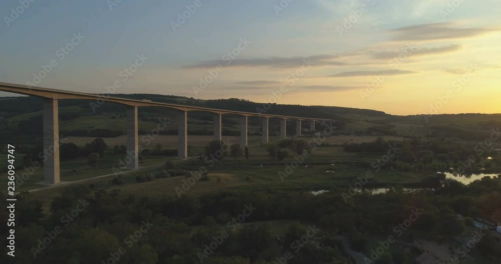 Aerial shot of M7 motorway Viaduct in Hungary at sunset with lake Balaton in view Aerial shot of M7 motorway Viaduct in Hungary at sunset with lake Balaton in view