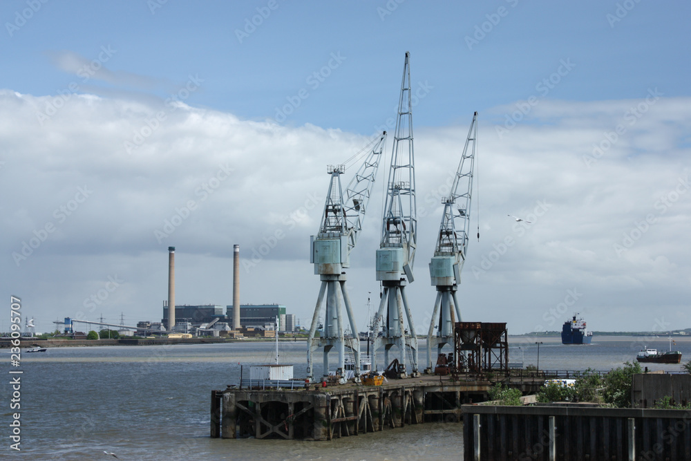 Cranes on the Thames Estuary, Gravesend, Kent, UK Cranes on the Thames Estuary, Gravesend, Kent, UK