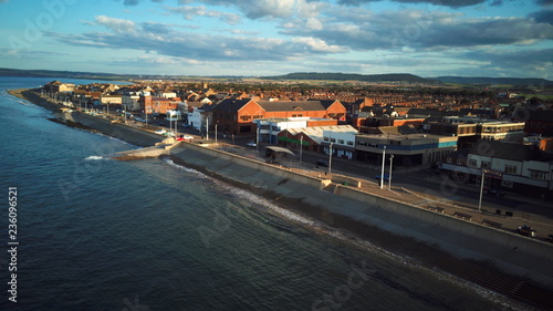 view from above of the coastline of redcar teesside showing the sea and the town with the slipway and blue sky