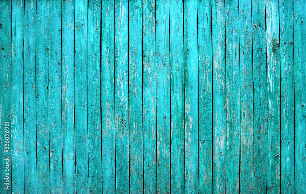 Turquoise barn wooden board wall. Old blue planking texture. Painted grunge hardwood background surface Turquoise barn wooden board wall. Old blue planking texture. Painted grunge hardwood background surface