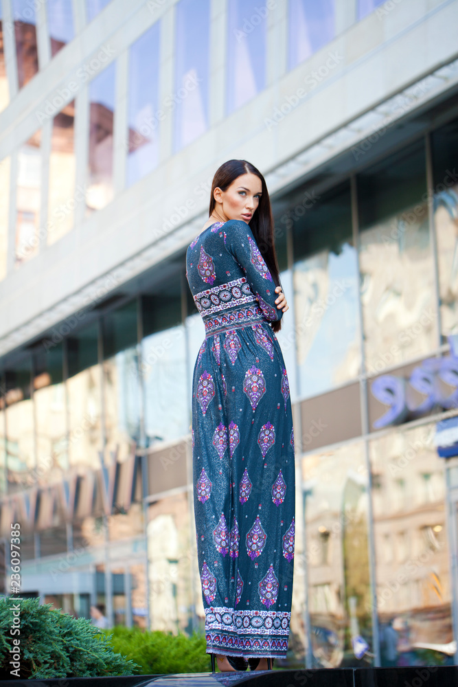 Beautiful young woman in colorful dress Beautiful young woman in colorful dress