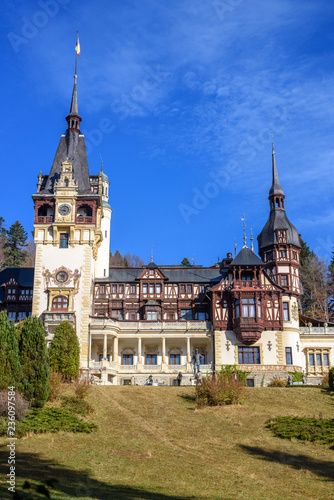 Fototapeta Naklejka Na Ścianę i Meble -  Peles Castle at daylight in autumn colors