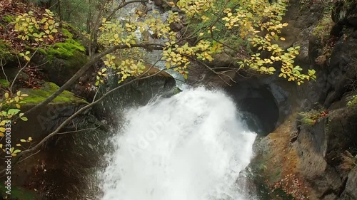 SLO MO Detail of Gainsfeld Waterfall in Bischofshofen, Salzburg, Austria in autumn. photo