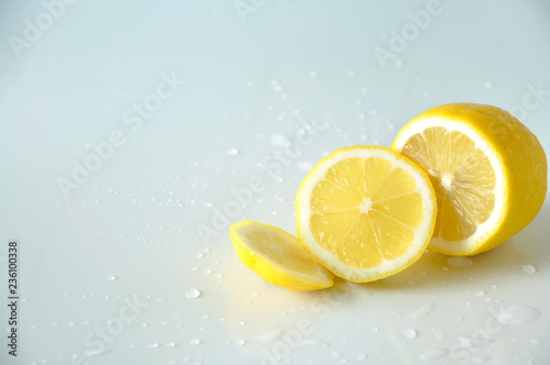Half of Fresh Lemon Pieces on White Background