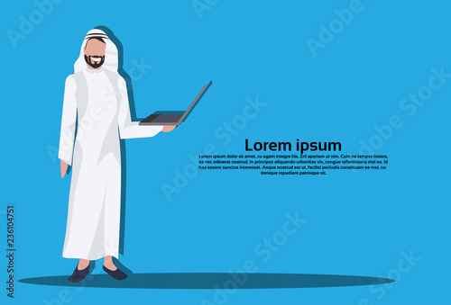 Arabic business man using laptop wearing traditional clothes arab businessman male cartoon character avatar blue background full length horizontal copy space flat