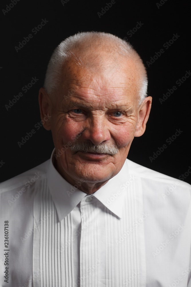 Assured senior in white shirt Assured senior in white shirt