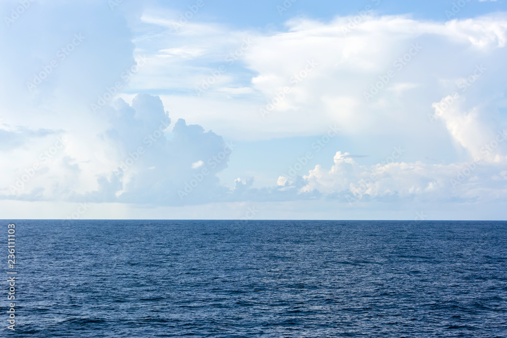 Ocean surface and cloudy sky for natural background. Ocean surface and cloudy sky for natural background.