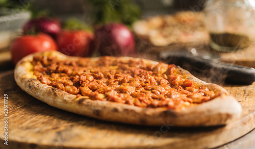 Traditional oven baked Macedonian meat pie pastrmajlija. Macedonian Pizza photo