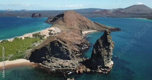 Drone flight over famous Pinnacle Rock, Bartolome Island, Galapagos, Ecuador photo