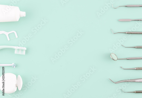 Dentist tools. Teethcare, dental health concept. Light blue background top view copy space flat lay. Teeth care fresh breath