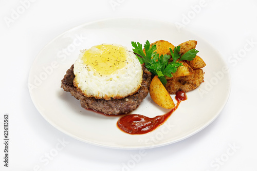 Fried eggs on white background