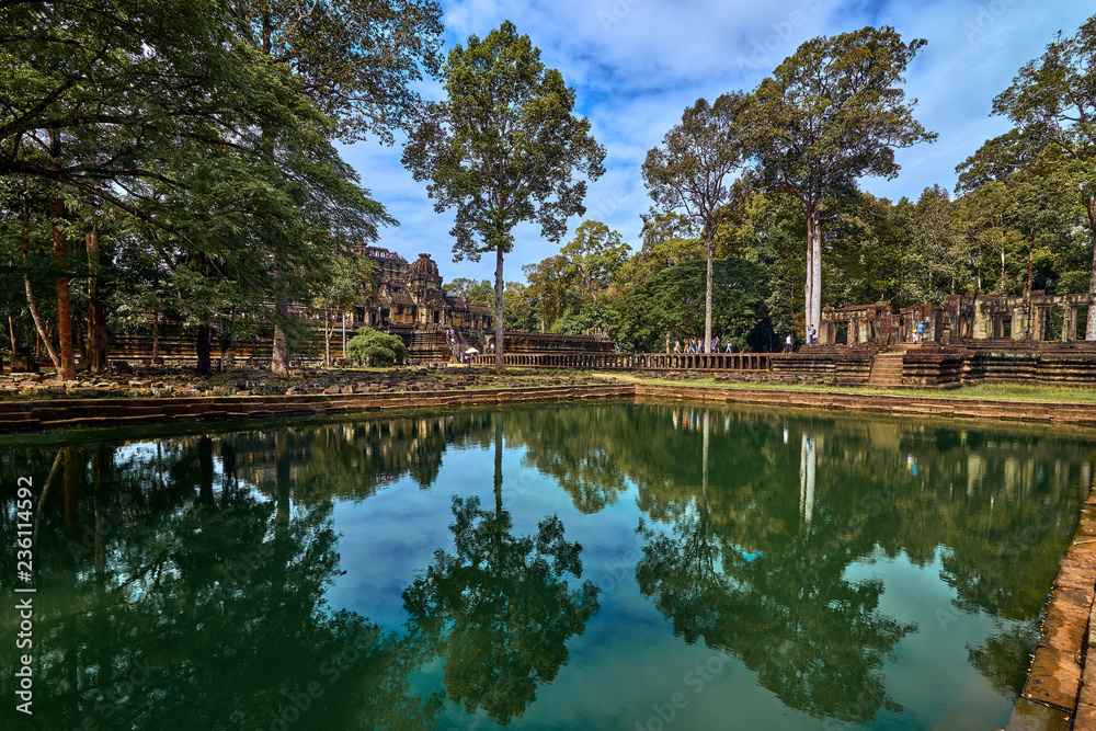 View of Baphuon temple at Angkor Wat complex is popular tourist attraction, Angkor Wat Archaeological Park in Siem Reap, Cambodia UNESCO World Heritage Site View of Baphuon temple at Angkor Wat complex is popular tourist attraction, Angkor Wat Archaeological Park in Siem Reap, Cambodia UNESCO World Heritage Site