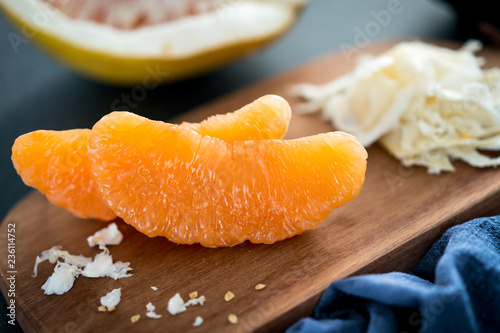 Honey pomelo pulp on the chopping board 