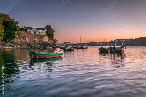 Sunset in Heisa island ,nile and reflection of boats in Aswan Egypt