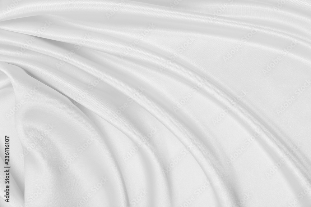 Fototapeta premium Smooth elegant white silk or satin luxury cloth texture as wedding background. Luxurious Christmas background or New Year background design