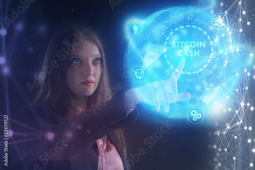 The concept of business, technology, the Internet and the network. A young entrepreneur working on a virtual screen of the future and sees the inscription: bitcoin cash