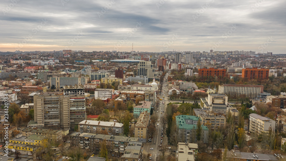 Urban aerial view photo from drone of downtown skyline. Cityscape of Dnipro city in Ukraine on the background of the sky.