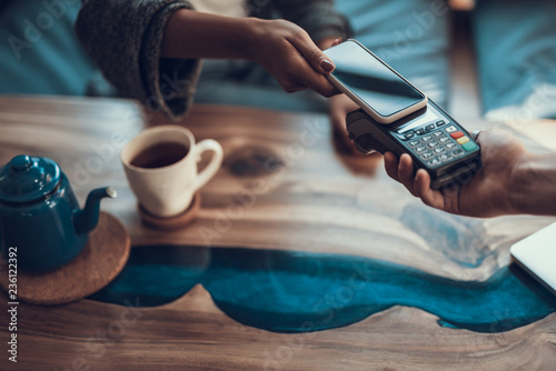 Horizontal image of contactless payment with smartphone photo