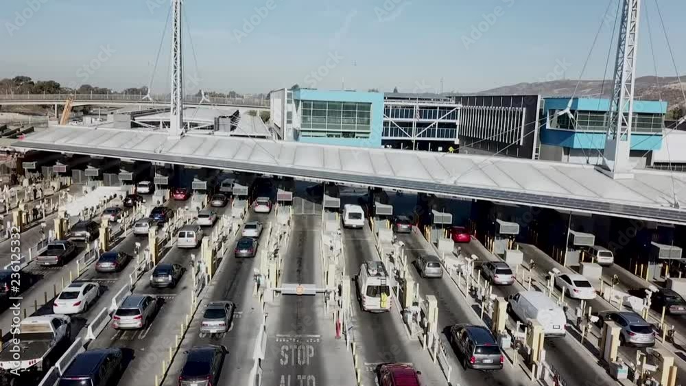 Drone video of cars lined up at San Ysidro San Diego California and Mexican Tijuana border