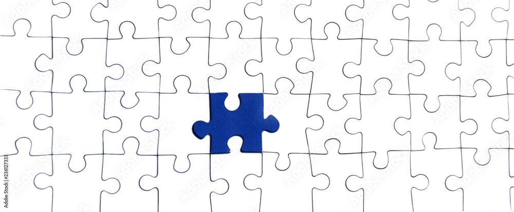 Background of white puzzle with bright blue puzzle center Background of white puzzle with bright blue puzzle center