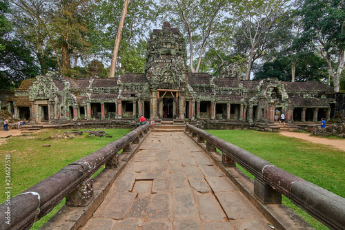 SIEM REAP, CAMBODIA - 13 December 2014: Trees raised on the ruins of the temple Ta Prohm,temple at Angkor Wat complex, Angkor Wat Archaeological Park in Siem Reap, Cambodia UNESCO World Heritage Site