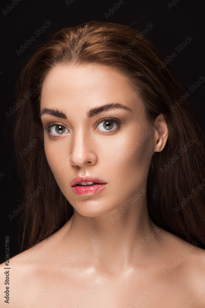 portrait of beautiful young woman with brunette hair, isolated on grey portrait of beautiful young woman with brunette hair, isolated on grey