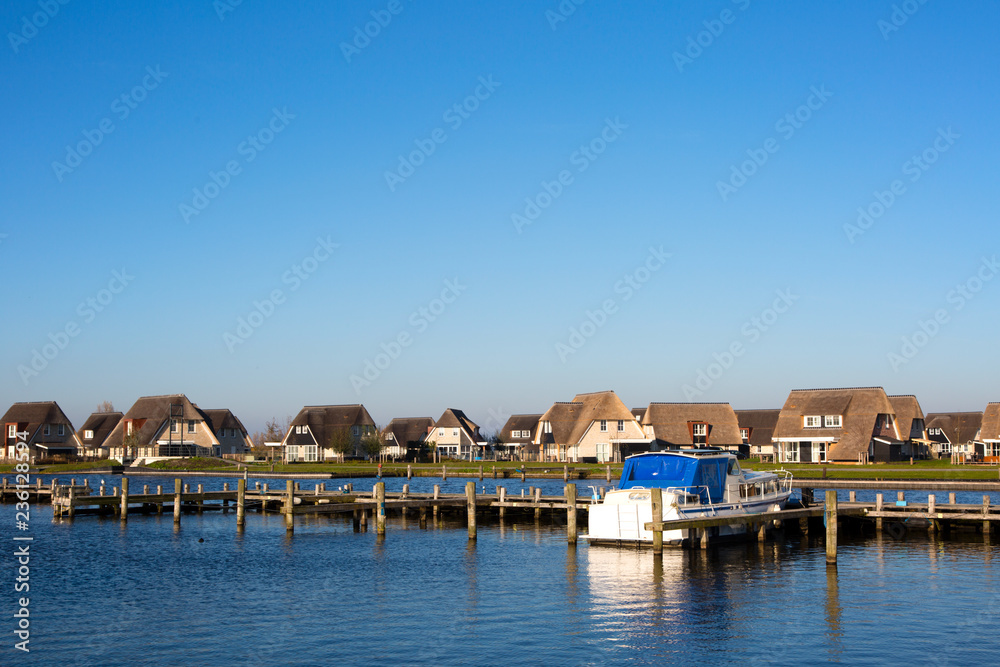 Holiday homes on the waterfront in Friesland, the Netherlands.