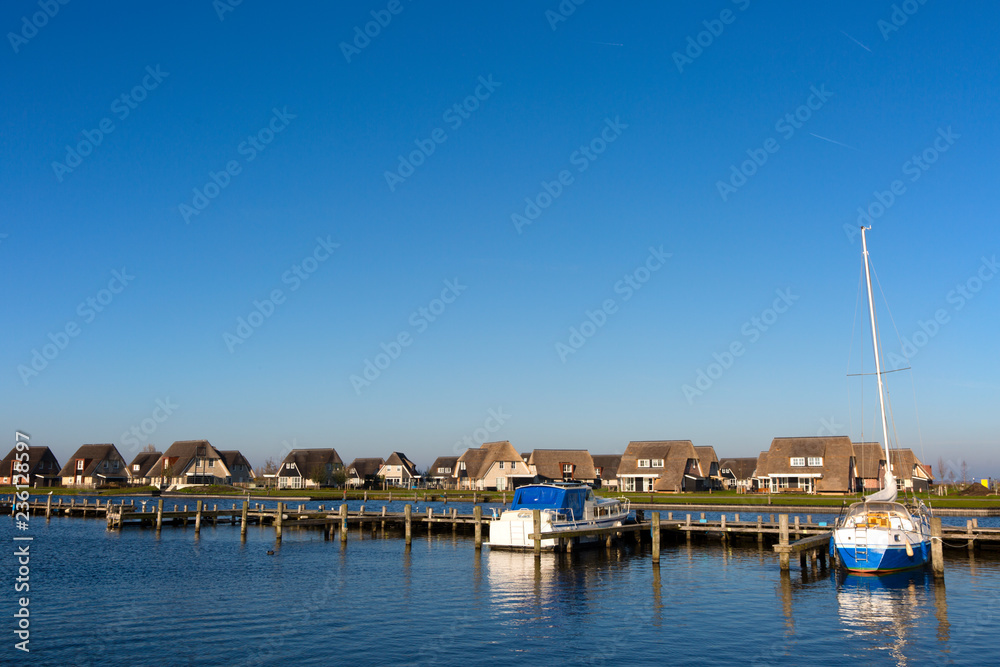 Holiday homes on the waterfront in Friesland, the Netherlands.