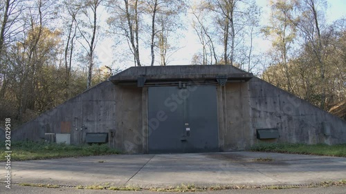 Munition bunker in forest photo