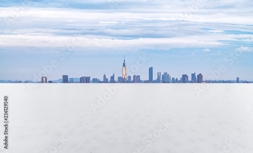 Panoramic skyline and buildings with empty snow ground