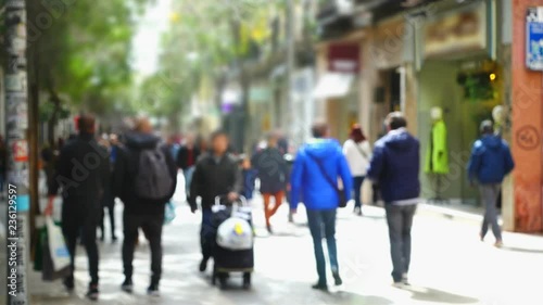 Movement of people along Fuencarral street. Madrid, Spain. Out of focus.