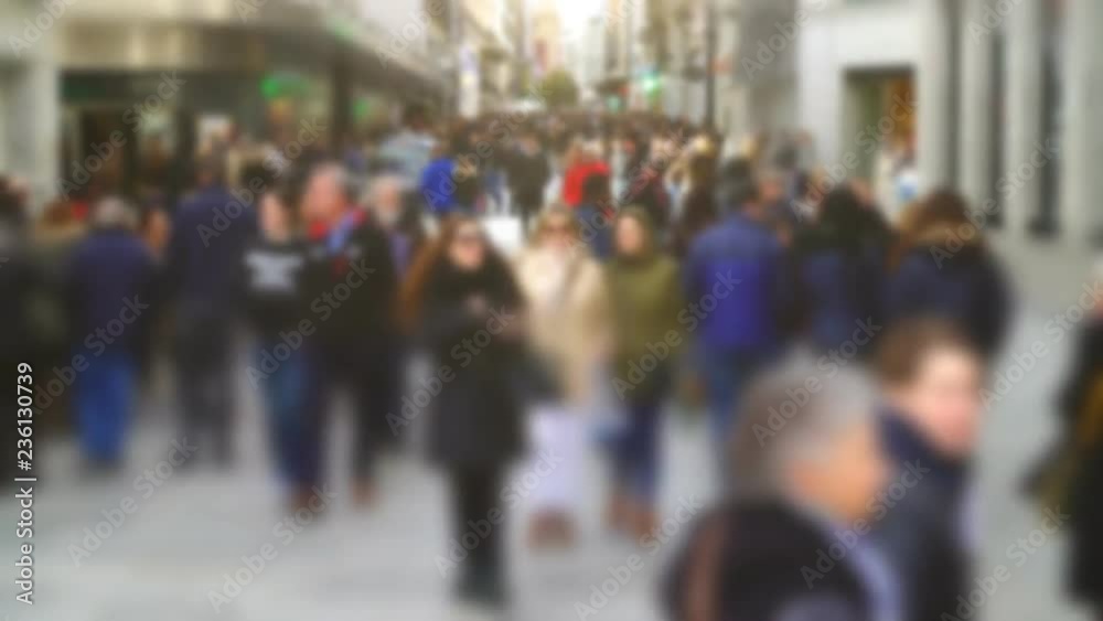 People on Calle del Carmen Street. Madrid, Spain. Out of focus. Time lapse. Calle del Carmen Street, near Puerta del Sol Square. People on Calle del Carmen Street. Madrid, Spain. Out of focus. Time lapse. Calle del Carmen Street, near Puerta del Sol Square.
