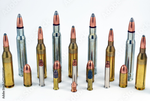 фотографія Different size and caliber ammunition for handguns and rifles