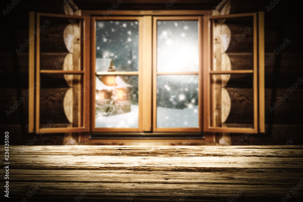 Fototapeta premium wooden table of free space for your decoration and wooden window with winter landscape 