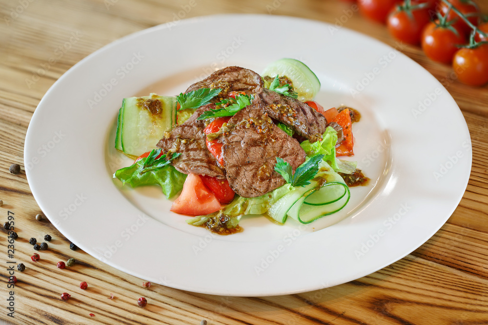 Steak on white plate Steak on white plate