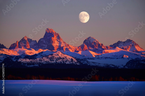 Sunset Light Alpen Glow on Tetons Teton Mountains wtih Moon Rising photo