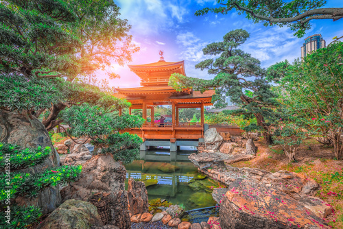 The Golden pavilion and gold bridge in Nan Lian Garden near Chi Lin Nunnery, famous landmark in Hong Kong.